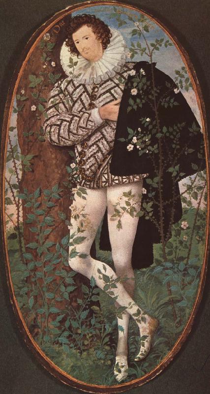  An unknown youth leaning against a tree among roses